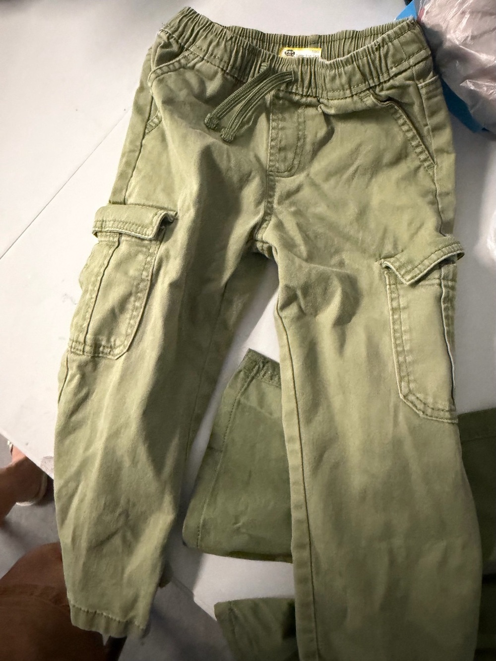Cat & Jack Olive Green Drawstring Kids Pants 3T has 2 whit spots. See pic